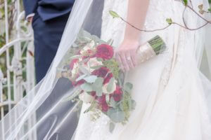 Special Moments Event Planning - Tammy Waterman - Clearwater Beach Wedding Planner - best wedding planner in Tampa Bay - white and red bridal bouquet