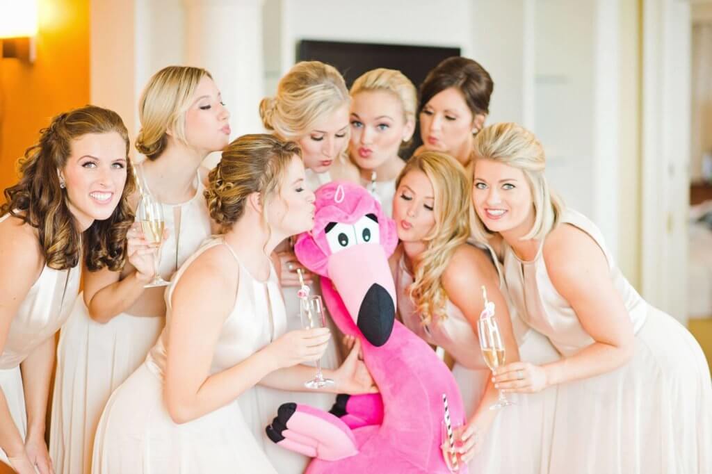 bride- bridesmaids- bride with pink flamingo