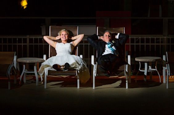bride and groom - bride and groom in lounge chairs