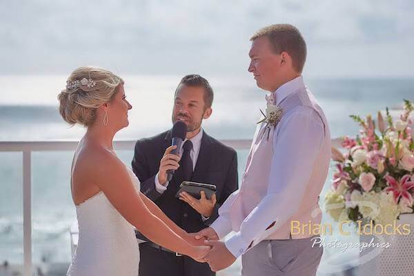 bride and groom exchanging vows - clearwater beach destination wedding - gulf of Mexico - clearwater beach