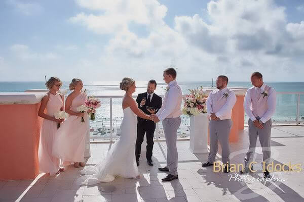 bride and groom - exchanging wedding vows- clearwater beach wedding- clearwater beach destination wedding - 