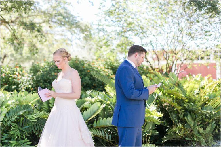 Special Moments Event Planning – Tampa Wedding Planner – Davis Island Garden Club – Davis Island Garden Club Wedding -bride and groom reading notes from the other