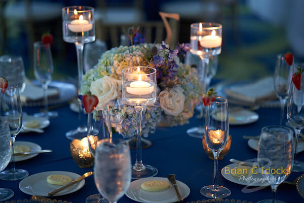 Opal Sands Wedding- Clearwater Beach Weddings – Clearwater Beach Wedding Planner - blue and gold wedding-wedding centerpieces with floating candles