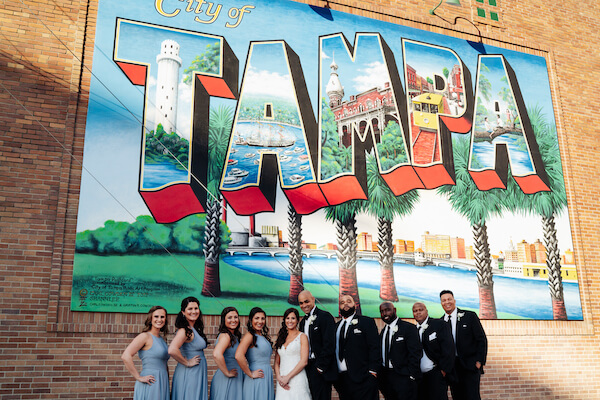 Tampa wedding – downtown Tampa wedding – Sacred Heart Tampa wedding – The Hip Room Wedding - Tampa Wedding planner - wedding party in front of tampa mural