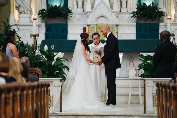 Tampa wedding – downtown Tampa wedding – Sacred Heart Tampa wedding – The Hip Room Wedding - Tampa Wedding planner - exchanging wedding vows