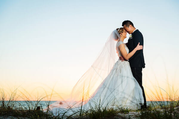 Clearwater Beach Wedding – Hyatt Regency Clearwater Beach – Clearwater Beach wedding planner - bride and groom at sunset