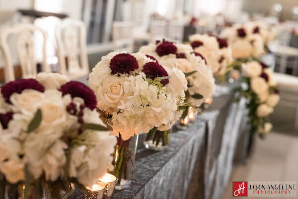 The Vault – Tampa Wedding Venue – Tampa Wedding Planner - head table - bridesmaids bouquets