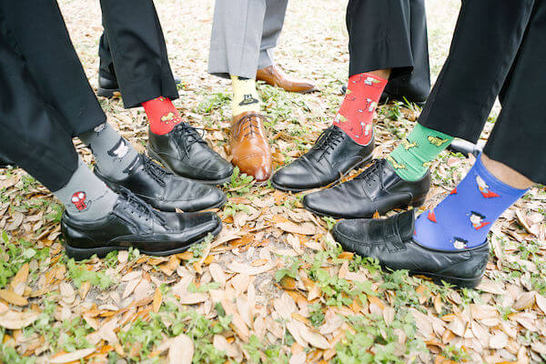 Tampa wedding planner- Special Moments Event Planning – Tampa Garden Club wedding- groomsmen with fun socks