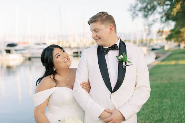 bride and groom - Stella York - Groom in white tuxedo jacket - St Petersburg wedding - St Petersburg wedding planner