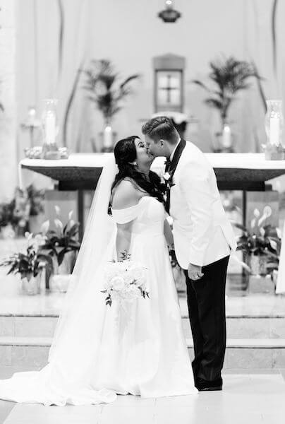 bride and groom - Catholic wedding ceremony - St Petersburg wedding - St Petersburg wedding planner - first kiss- just married