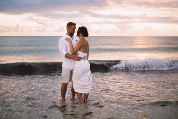  Special Moments Event Planning – Clearwater Beach Wedding – Clearwater Beach Wedding Planner- Clearwater Beach Destination Wedding- bride- groom - bride and groom at sunset - bride and groom at sunset on Clearwater Beach - brie era groom in the Gulf of Mexico