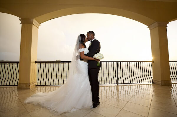 Bride and Groom overlooking beach - Clearwater Beach wedding - Tropical Storm Nestor - wedding planner rescues wedding