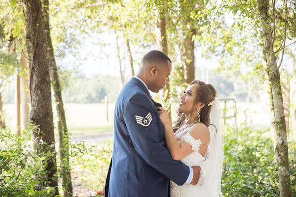 Special Moments Event Planning - Tampa Bay wedding - Secret Garden Wedding - 911 wedding - Military couple - bride and groom - Groom in Air Force uniform - first look