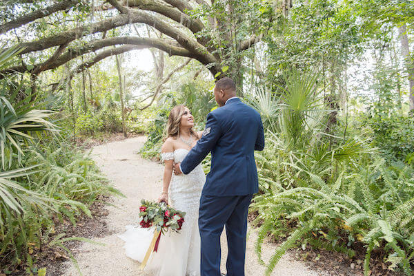 Special Moments Event Planning - Tampa Bay wedding - Secret Garden Wedding - 911 wedding - Military couple - bride and groom - Groom in Air Force uniform - first look