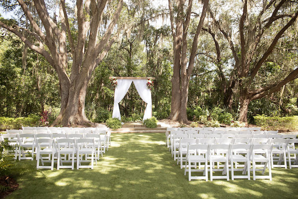 Special Moments Event Planning - Tampa Bay wedding - Secret Garden Wedding - 911 wedding - rustic wedding arch - outdoor wedding ceremony - red white and blue wedding