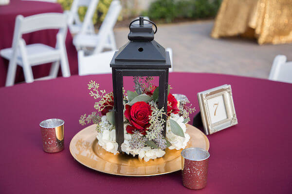 Special Moments Event Planning - Tampa Bay wedding - Secret Garden Wedding - 911 wedding - Military couple - red, white and blue wedding, gold charger plates, simple wedding centerpieces