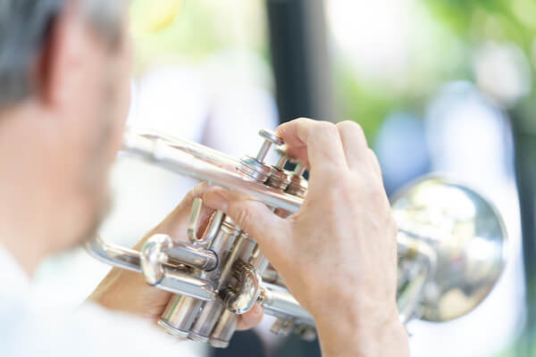 Special Moments Event Planning - second line - wedding parasol - st Petersburg wedding - st Petersburg wedding planner - unique wedding details - New Orleans Jazz - trumpet