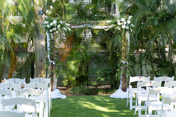 St Petersburg Florida - Special Moments Event Planning - Garden wedding ceremony- outdoor wedding ceremony - wedding arch with crystal chandelier - St Petersburg wedding planner