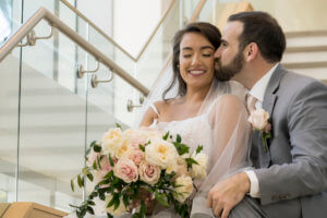 Clearwater Beach wedding - Wyndham Grand Clearwater Beach - blush wedding - blush bridal bouquet- bride and groom on stairs- first look