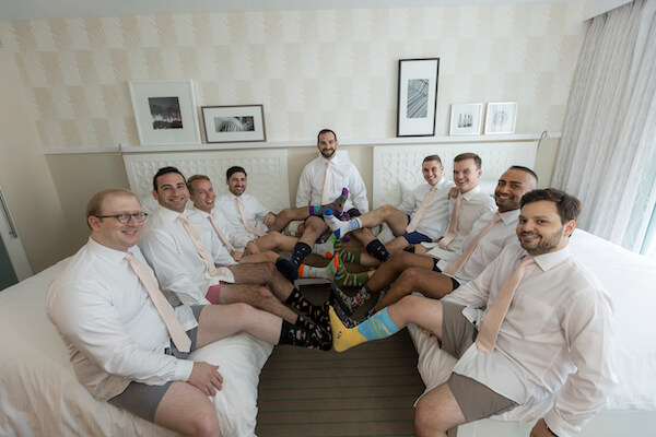 Clearwater Beach wedding - Wyndham Grand Clearwater Beach - Wyndham Grand wedding- groom with groomsmen - groom and groomsmen in fun socks