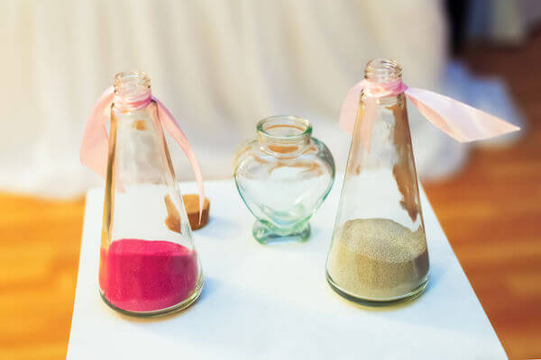 wedding ceremony - beach wedding ceremony. - sand ceremony - unique ideas for a wedding ceremony - heart shaped vase for a sand ceremony - two colors of sand for a sand ceremony