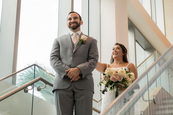 Clearwater Beach wedding - Clearwater Beach - Wyndham Grand Clearwater Beach - Wyndham Grand Clearwater Beach wedding - Wyndham Grand weddings - Clearwater Beach Jewish wedding - blush wedding - first look - bride walking to groom - bride- groom- bride and groom on stairs