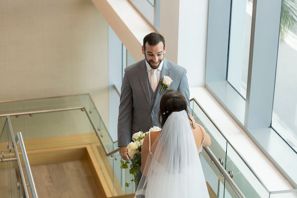 Clearwater Beach wedding - Clearwater Beach - Wyndham Grand Clearwater Beach - Wyndham Grand Clearwater Beach wedding - Wyndham Grand weddings - Clearwater Beach Jewish wedding - blush wedding - first look- bride and groom on stairs