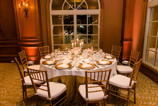 Ritz Carlton Sarasota wedding reception - gold charger plates - gold chivari chairs -gold linen - pink and white centerpieces- Ritz Carlton - Ritz Carlton wedding - Ritz Carlton Sarasota - Ritz Carlton Sarasota wedding - Sarasota wedding - Sarasota black tie wedding