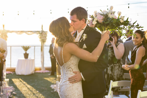 Clearwater Beach Wedding – Opal Sands Wedding – Special Moments Event Planning - just married - first kiss- sunset wedding ceremony - beachfront wedding ceremony - waterfront wedding ceremony