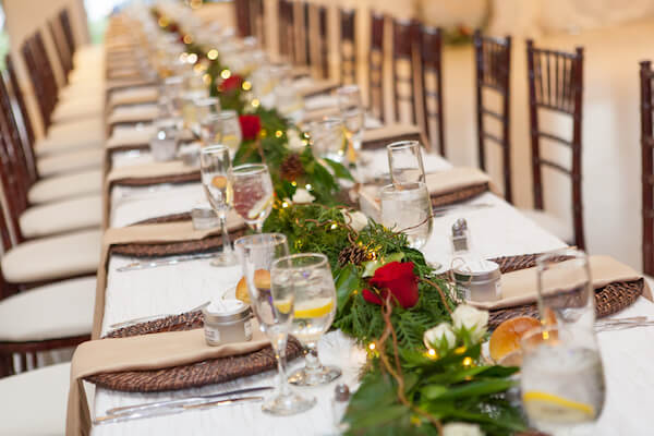 Special Moments Event Planning – Tampa Wedding – Tampa Wedding Planner - Tampa Garden Club - Tampa Garden Club wedding - holiday weddings- long reception tables - rattan charger plates