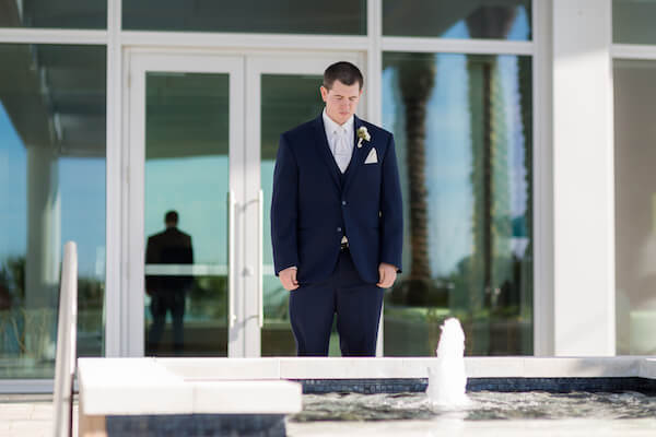 Clearwater Beach Wedding – Opal Sands Wedding – Special Moments Event Planning - groom- groom in blue suit- groom waiting for bride- first look