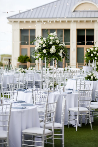 Sandpearl Resort – Sandpearl Wedding – Clearwater Beach Wedding – Greek wedding – Clearwater Beach wedding planner – Special Moments Event Planning - outdoor wedding reception - white dance floor - silver and white wedding - outdoor wedding reception at the Sandpearl Resort - silver chivari chairs