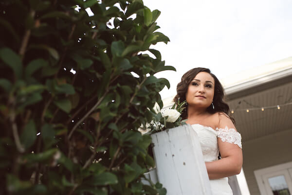 First Look – Bradenton wedding – Palma Sola Botanical Park wedding – Special Moments Event Planning - bride looking at wedding ceremony - bride getting ready to walk down the aisle