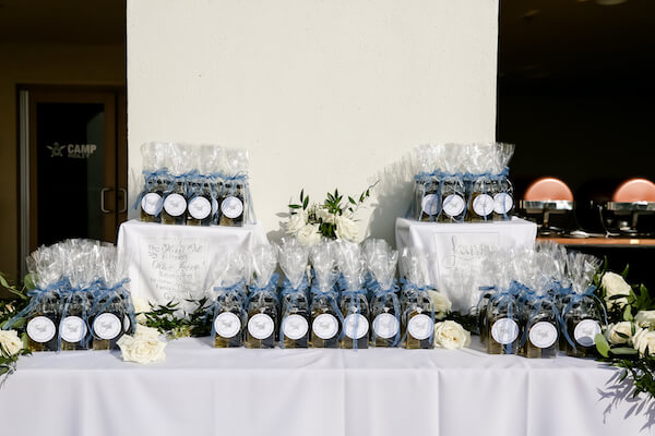 Sandpearl Resort – Sandpearl Wedding – Clearwater Beach Wedding – Greek wedding – Clearwater Beach wedding planner – Special Moments Event Planning - outdoor wedding reception - white dance floor - silver and white wedding - outdoor wedding reception at the Sandpearl Resort - wedding favors- olive oil and vinegar for wedding favor - wedding favor