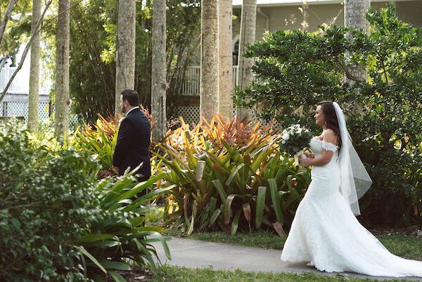 First Look – Bradenton wedding – Palma Sola Botanical Park wedding – Special Moments Event Planning - bride walking up behind groom