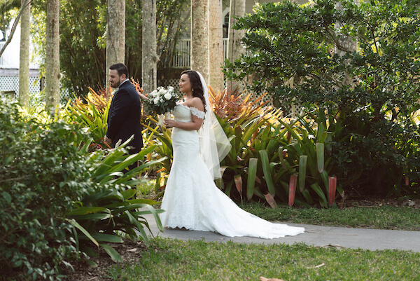 First Look – Bradenton wedding – Palma Sola Botanical Park wedding – Special Moments Event Planning - bride walking up behind groom