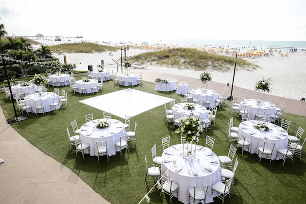 Sandpearl Resort – Sandpearl Wedding – Clearwater Beach Wedding – Greek wedding – Clearwater Beach wedding planner – Special Moments Event Planning - outdoor wedding reception - white dance floor - silver and white wedding - outdoor wedding reception at the Sandpearl Resort