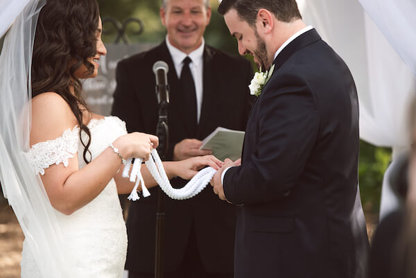 Bradenton wedding – Palma Sola Botanical Park wedding - Special Moments Event Planning - bride - groom - bride and groom tying three chords - three cords