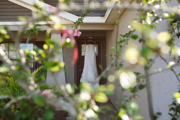 Bradenton wedding – Palma Sola Botanical Park wedding- Special Moments Event Planning - brides gown hung outside of her home - wedding gown