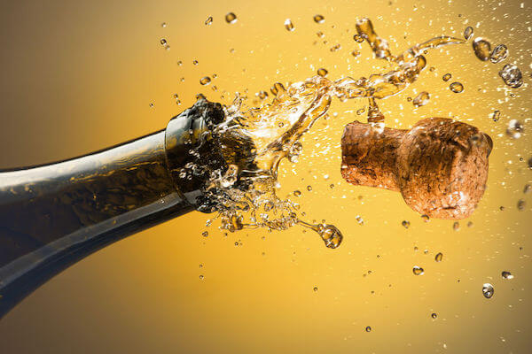 time to celebrate - wedding planning. - Tampa weddings - Tampa wedding planner - celebrations - popping a champagne cork