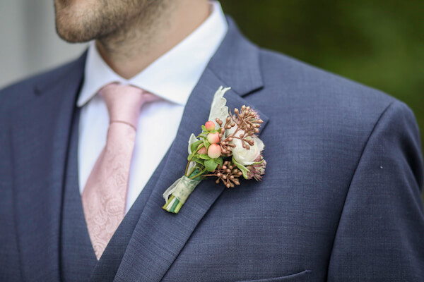 Opal Sands Resort - Opal Sands Resort Wedding - Clearwater Beach wedding - groom - grooms boutonniere - pink and rose gold boutonniere