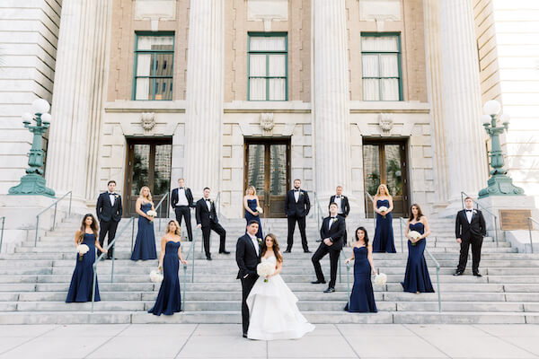 Tampa wedding. - Le Meridien Hotel Tampa -bride and groom with wedding party - wedding party on the steps of the Le Meridien Hotel Tampa