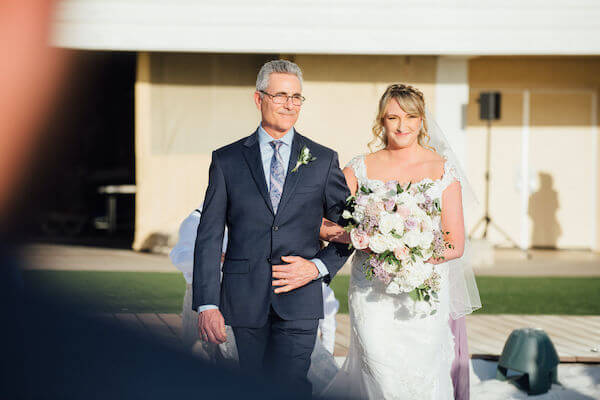 Special moments Event Planning x- Clearwater Beach wedding - Clearwater Beach wedding planner - Sandpearl Resort wedding - bride walking down the aisle with father