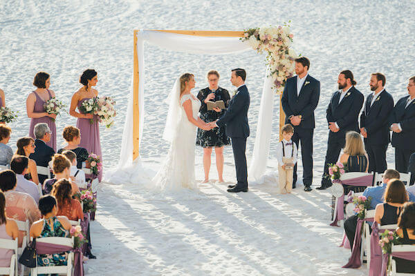 Special moments Event Planning x- Clearwater Beach wedding - Clearwater Beach wedding planner - Sandpearl Resort wedding - beach wedding ceremony. - Clearwater Beach wedding ceremony - bride and groom exchanging wedding vows