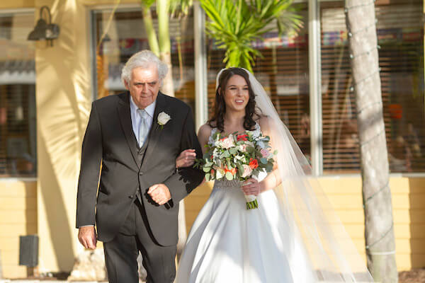 Clearwater Beach Wedding - Holiday inn and Suite Clearwater beach - Special Moments Event Planning - bride making her entrance with her father - Father of the Bride - bride