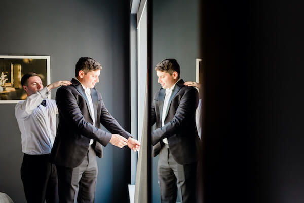 Tampa wedding - Tampa Groom - groom- groom getting dressed - groom in classic black tuxedo