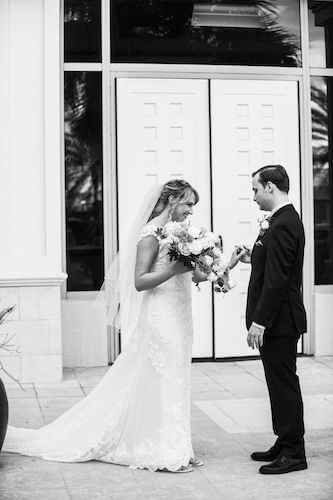 Special moments Event Planning x- Clearwater Beach wedding - Clearwater Beach wedding planner - Sandpearl Resort wedding - black and white photo of bride and groom's first look - bride and groom