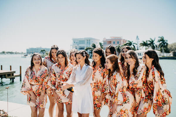 Florida wedding – Saint Petersburg Florida wedding – Saint Petersburg wedding – Greek wedding -  bride with wedding party - bride with bridal party - bride getting ready - bride popping Champagne 