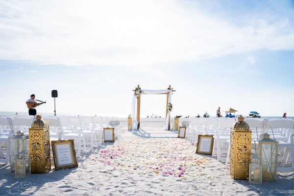 Sirata Beach Resort wedding - outdoor wedding ceremony - gold lanterns - bamboo wedding structure