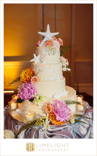 wedding cake with fresh flowers and Starfish - Starfish cake topper - beach themed wedding cake